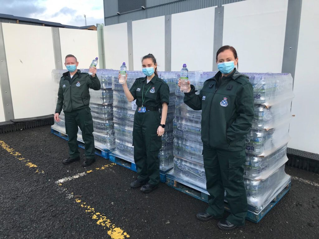 Highland Spring Team serve water from the Ochil Hills - supporting people and planet.